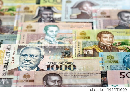 Haitian gourde money bills pile on table. Haiti banknotes of HTG currency. Concept of business 143551699