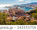 Aerial Scenic View of Malaga Cityscape with La Malagueta Bullring, Houses and Mediterranean Sea, Spain 143553756
