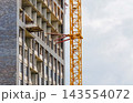 High rise construction with tower crane, real estate development and urban investment concept 143554072