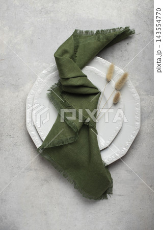 Knotted Dark Green Fringed Linen Napkin Place Setting Knotted Dark Green Fringed Linen Napkin Place Setting 143554770