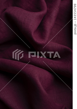 Burgundy Wine Red Draped Linen Fabric Texture Close Up Burgundy Wine Red Draped Linen Fabric Texture Close Up 143554799