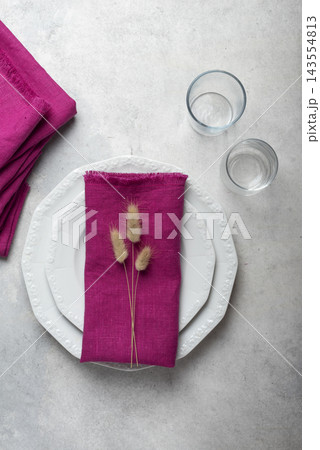 Folded Fuchsia Pink Fringed Linen Napkin Place Setting Folded Fuchsia Pink Fringed Linen Napkin Place Setting 143554813