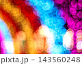Abstract colorful bokeh lights background for Christmas and holiday celebration festive design 143560248