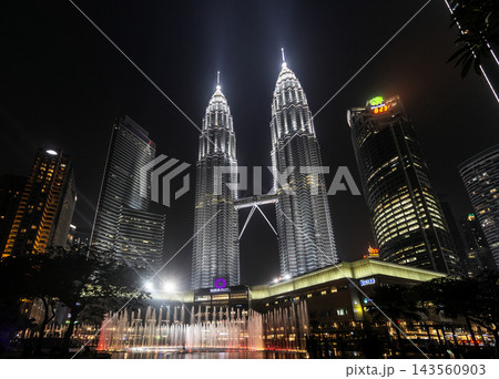 Petronas towers famous Kuala Lumpur landmark tourist attraction at KLCC modern urban city area in malaysia Petronas towers famous Kuala Lumpur landmark tourist attraction at KLCC modern urban city area in malaysia 143560903