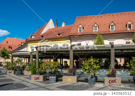 Red tiled houses with eye windows in Large Square Sibiu Red tiled houses with eye windows in Large Square Sibiu 143563512
