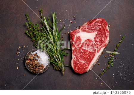 Top view of raw beef steak with generous copy space Top view of raw beef steak with generous copy space 143566079