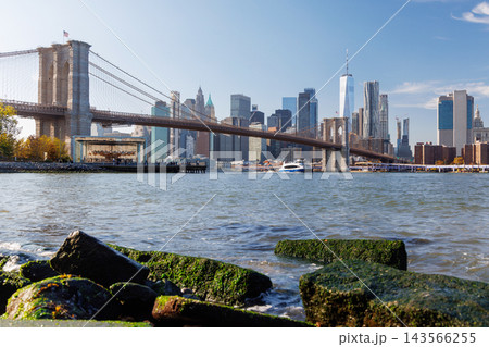 Iconic view of Brooklyn Bridge with Manhattan skyscrapers Iconic view of Brooklyn Bridge with Manhattan skyscrapers 143566255