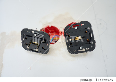 Electrical outlets pulled from wall during installation Electrical outlets pulled from wall during installation 143566525