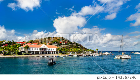 Waterfront view of the Government Building and boats anchored in the harbor of Gustavia, Saint Barthelemy, Caribbean France Waterfront view of the Government Building and boats anchored in the harbor of Gustavia, Saint Barthelemy, Caribbean France 143567246