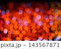 Orange and red bokeh lights abstract background for Christmas and festive night celebration 143567871