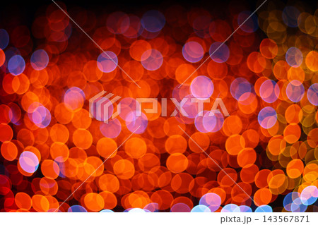 Orange and red bokeh lights abstract background for Christmas and festive night celebration 143567871