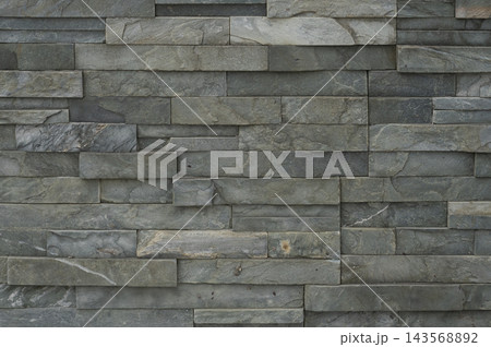 Dark Gray Stacked Slate Stone Wall Cladding Tile Texture Background Dark Gray Stacked Slate Stone Wall Cladding Tile Texture Background 143568892