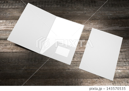 File folder mockup showing front cover and content pages on wooden background File folder mockup showing front cover and content pages on wooden background 143570535