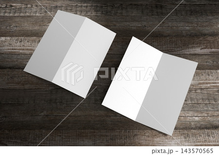Double DL flyer mockup on wooden background Double DL flyer mockup on wooden background 143570565