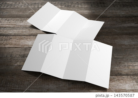 Four DL flyer mockup on wooden background Four DL flyer mockup on wooden background 143570587