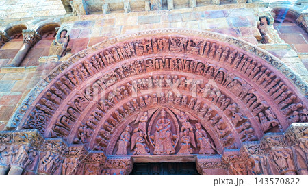 Santo Domingo Church facade showing Romanesque portal sculptures in Soria, Spain Santo Domingo Church facade showing Romanesque portal sculptures in Soria, Spain 143570822