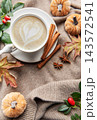 Autumn coffee latte with heart art and warm spices 143572541