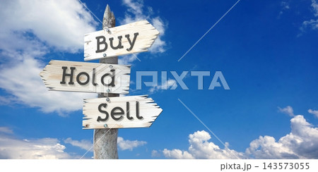 Buy, hold, sell - wooden signpost with three arrows 143573055