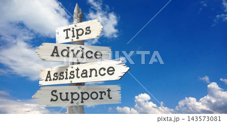 Tips, advice, assistance, support - wooden signpost with four arrows 143573081
