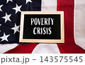 Poverty Crisis text on black chalkboard on USA flag background, social economic inequality awareness concept 143575545