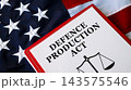 Defence Production Act document with scales of justice on USA flag background, federal defense legislation concept 143575546