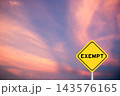 Yellow transportation sign with word exempt on violet color sky background 143576165