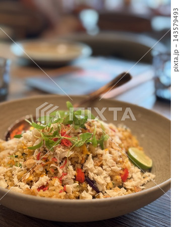 Gourmet crab meat fried rice with microgreens and lime Gourmet crab meat fried rice with microgreens and lime 143579493