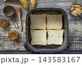 Step 1. Cooking toast bread with peanut butter and fried banana in an air fryer, in kitchen gadget modern. Lifestyle trendy of new cooking. Healthy cooking with air fryer. 143583167