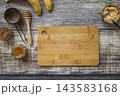 Ingredients for cooking toast bread with peanut butter and fried banana in kitchen gadget modern air fryer. Lifestyle trendy of new cooking. 143583168