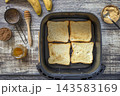 Step 2. Cooking toast bread with peanut butter and fried banana in an air fryer, in kitchen gadget modern. Lifestyle trendy of new cooking. Healthy cooking with air fryer. 143583169