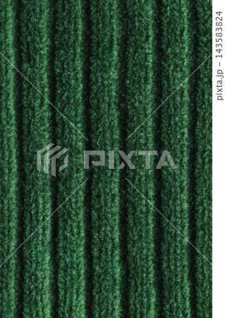 Textile background of green knitted sweater fabric. Soft fuzzy texture, vertical ribbed pattern 143583824