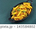 Tasty pasta with seasoned ground meat and chopped green onion 143584802