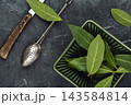 Fresh bay leaves for herbal tea making 143584814