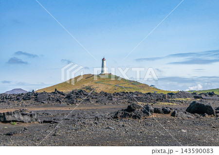 Reykjanesviti lighthouse in volcanic landscape in Iceland 143590083