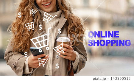 Shopping online while standing outdoors in a city with a coffee cup in hand and using a smartphone 143590513