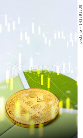 Bitcoin coin on a green leaf with financial graphs in the background during daytime Bitcoin coin on a green leaf with financial graphs in the background during daytime 143591539