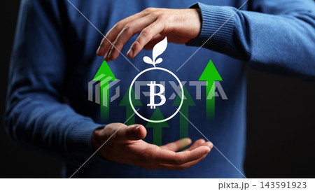 Man's hands surround a bitcoin symbol with growing green arrows, showing a concept of growth and investment 143591923