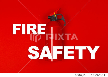 Emergency 911 fire safety equipment in training session for building occupants during safety awareness event Emergency 911 fire safety equipment in training session for building occupants during safety awareness event 143592351