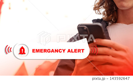 Emergency service alert received on mobile device during urgent situation in urban area Emergency service alert received on mobile device during urgent situation in urban area 143592647