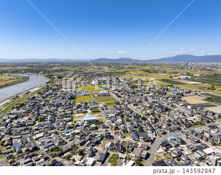 筑後川上空からドローン空撮した早津江川と佐賀平野の風景 筑後川上空からドローン空撮した早津江川と佐賀平野の風景 143592847