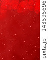 A Christmas background with bokeh and small snowflakes in red tones. 143595696