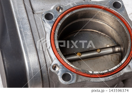 Car part engine throttle valve opened by the gas pedal to supply more air to the engine. Spare parts catalog for vehicles from the junkyard. Car part engine throttle valve opened by the gas pedal to supply more air to the engine. Spare parts catalog for vehicles from the junkyard. 143596374