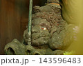 伝統的な石造りの神仏像 143596483