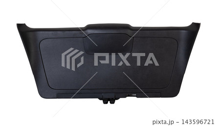 Sheathing of a car body part - trunk made of black plastic on a white isolated background in a photo studio for replacement or sale in a workshop 143596721