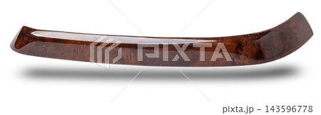 Decorative overlay of the panel and doors of the car interior from the root of the walnut tree in brown color Decorative overlay of the panel and doors of the car interior from the root of the walnut tree in brown color 143596778
