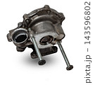 Metal automobile pump for cooling the engine of a water pump on a white background. The concept of used spare parts for the car engine from junkyard. 143596802