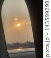 Airplane sunset 143599298