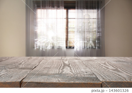 Empty wooden table in room. Space for design Empty wooden table in room. Space for design 143601326