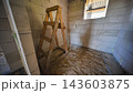 Unfinished corridor showing aerated concrete blocks and cement screed in a slavic village house 143603875