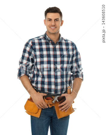 Handsome carpenter with tool belt isolated on white 143608510